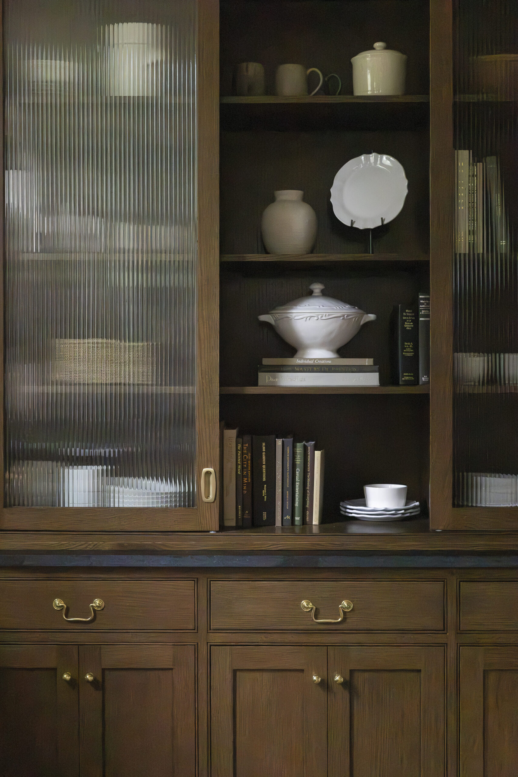 Pantry with floor to ceiling shelving bookcase