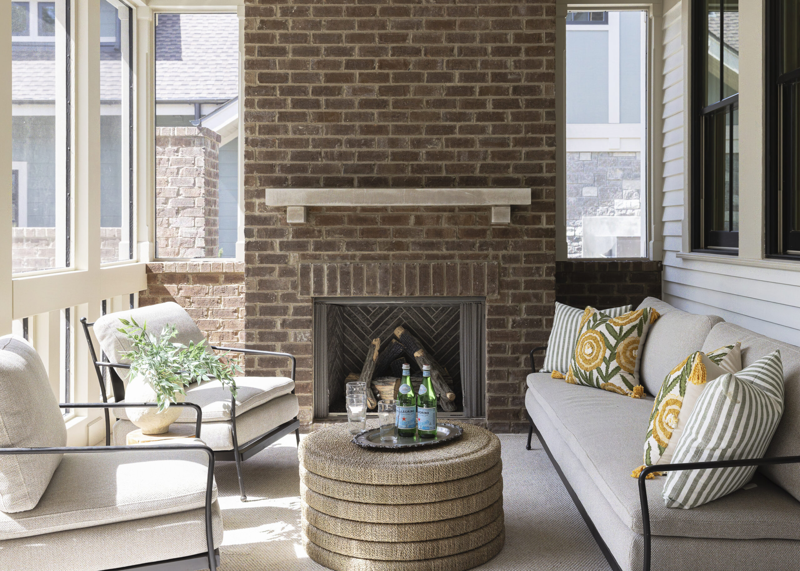 Back patio with brick faced fireplace