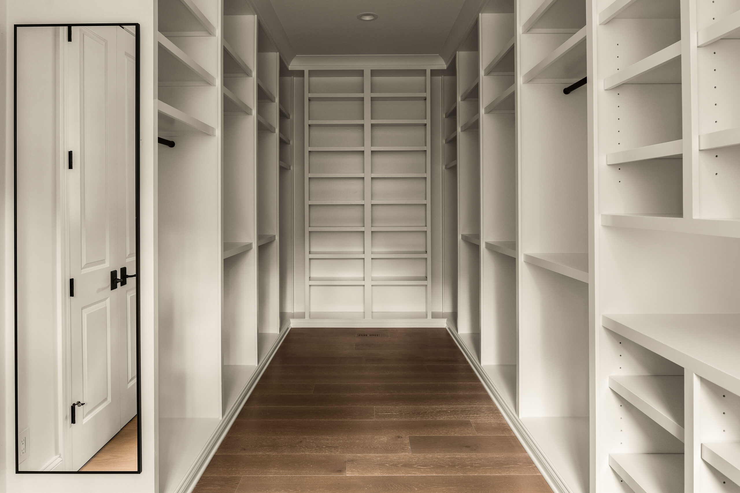 Large walk-in closet with open shelving