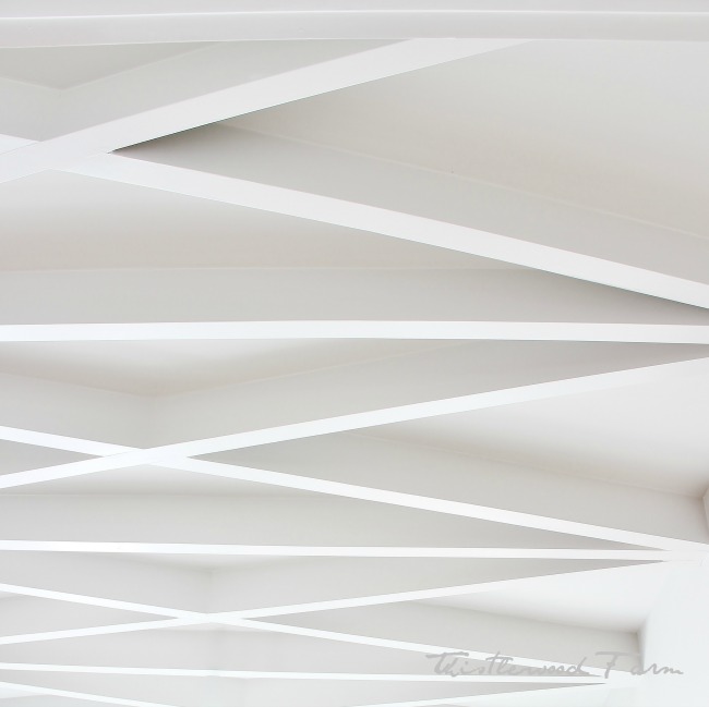 White ceiling with angular trimwork for visual interest