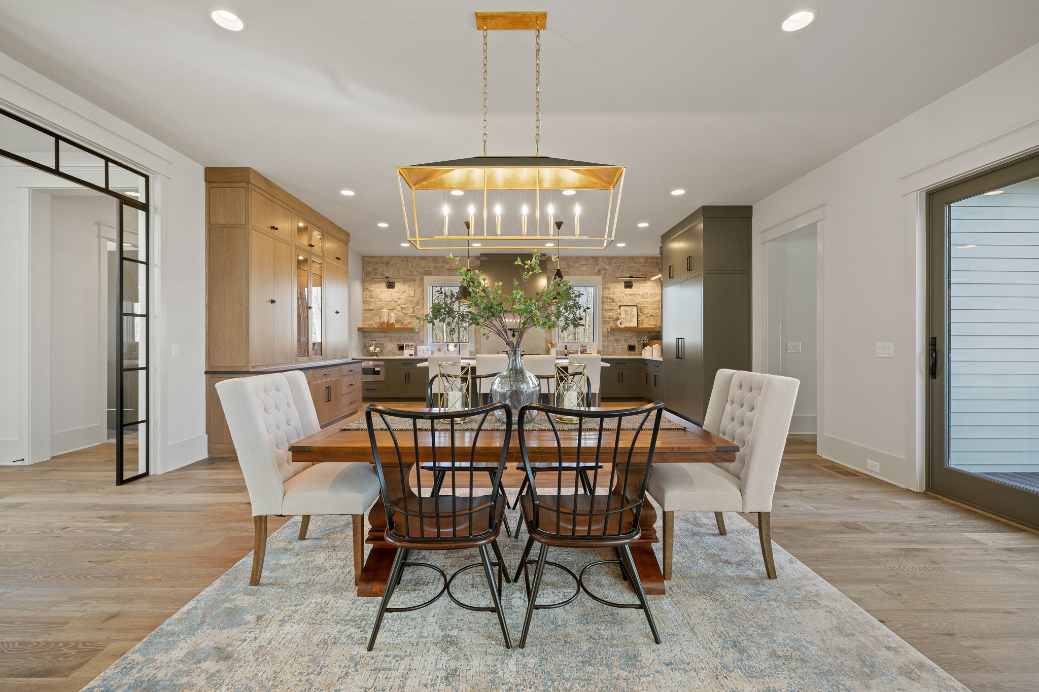 Dining table with view of kitchen